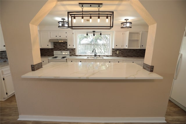 kitchen with white cabinetry, white appliances, sink, and light stone counters