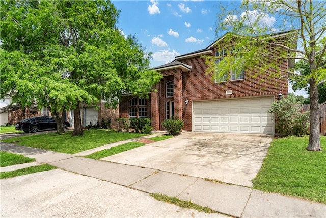view of front of house featuring a garage, driveway, a front lawn, and brick siding