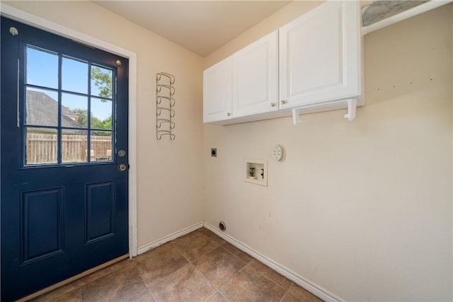 laundry area featuring washer hookup, baseboards, cabinet space, and hookup for an electric dryer