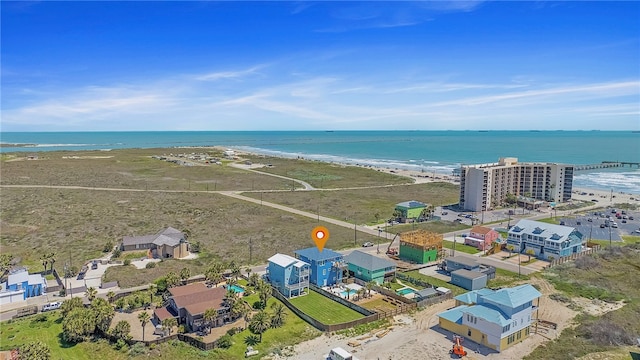 bird's eye view with a beach view and a water view