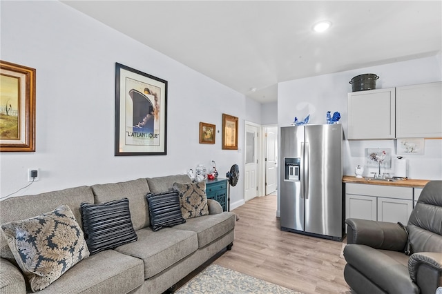 living room with light hardwood / wood-style floors