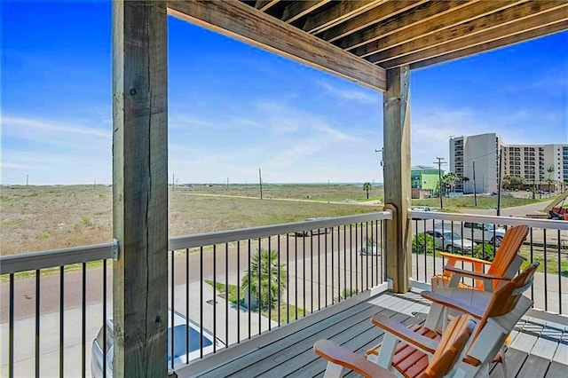 balcony featuring a rural view