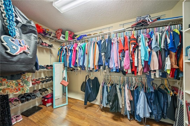 7905 Etienne Dr, Corpus Christi, TX 78414 - spacious closet with wood finished floors