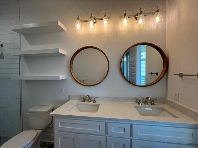 full bath featuring double vanity, toilet, and a sink