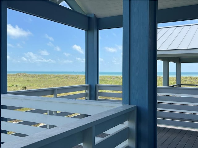 wooden deck with a water view