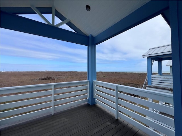 wooden terrace with a rural view