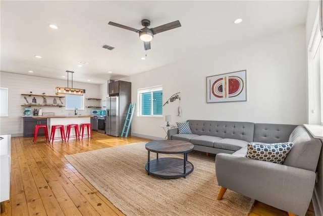 162 La Concha Blvd Unit 20, Port Aransas, TX 78373 - living area with ceiling fan, light wood-style flooring, and recessed lighting