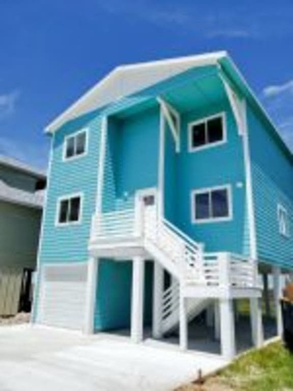 162 La Concha Blvd Unit 20, Port Aransas, TX 78373 - back of house with stairway