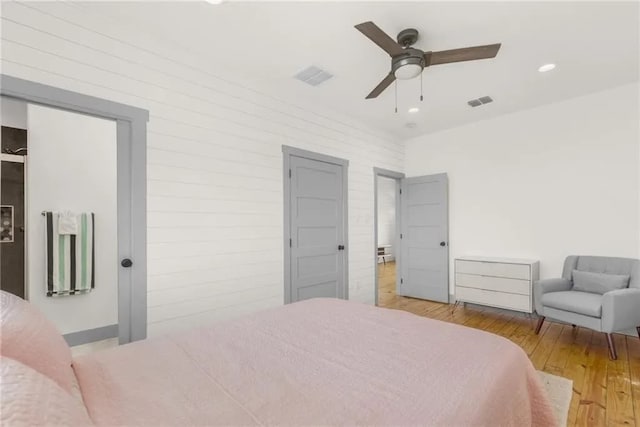 162 La Concha Blvd Unit 20, Port Aransas, TX 78373 - bedroom featuring light wood finished floors, recessed lighting, and ceiling fan