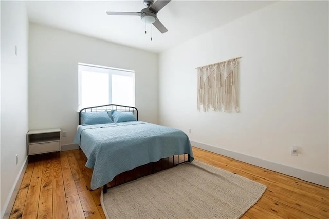 162 La Concha Blvd Unit 20, Port Aransas, TX 78373 - bedroom with hardwood / wood-style floors and a ceiling fan