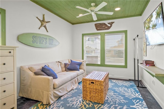 living room with recessed lighting, wooden ceiling, a wealth of natural light, and baseboards