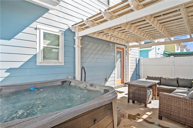 view of patio with a pergola, outdoor lounge area, fence, and a hot tub