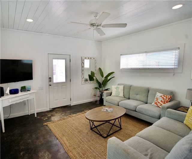 living area with baseboards, ceiling fan, ornamental molding, concrete floors, and recessed lighting