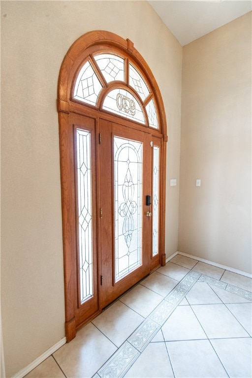 foyer featuring light tile patterned floors