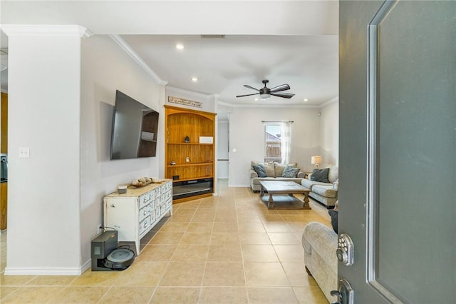 living area with light tile patterned floors, recessed lighting, a ceiling fan, and crown molding