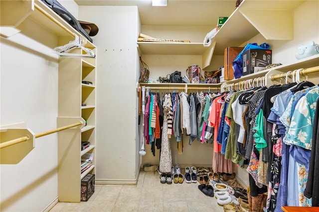 walk in closet featuring tile patterned floors