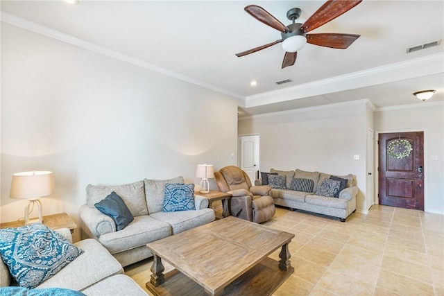 living area with visible vents and crown molding