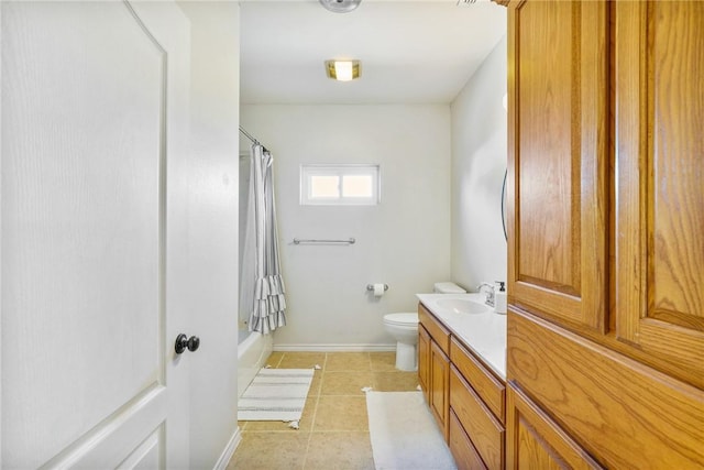 full bath with shower / tub combo, baseboards, toilet, tile patterned flooring, and vanity