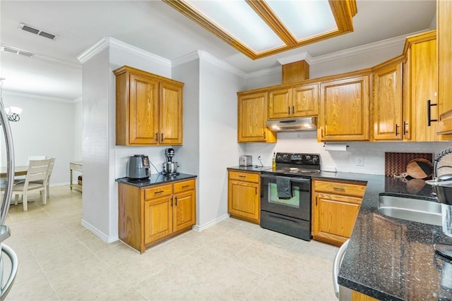 kitchen featuring under cabinet range hood, visible vents, black / electric stove, and brown cabinets