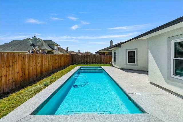 view of swimming pool with a patio area, a fenced backyard, and a fenced in pool