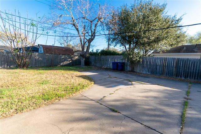 exterior space with a patio area and a fenced backyard