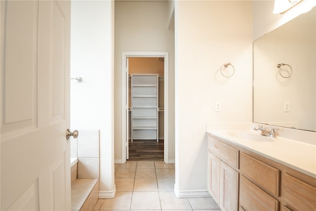 bathroom featuring vanity and tile patterned flooring