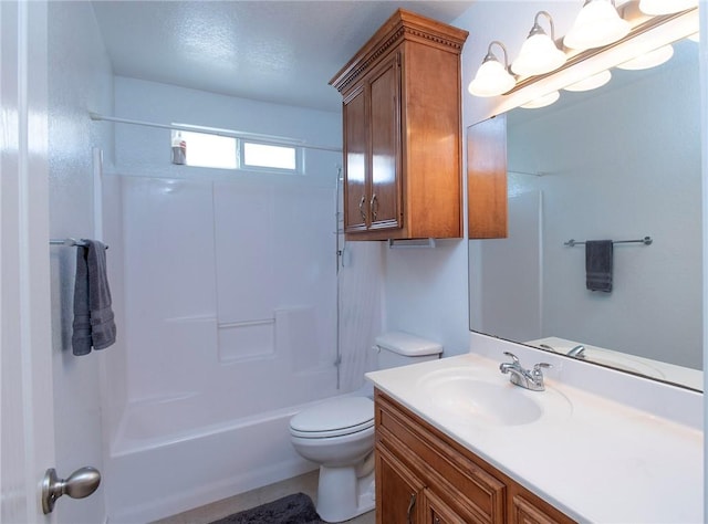 bathroom featuring shower / bath combination, toilet, and vanity