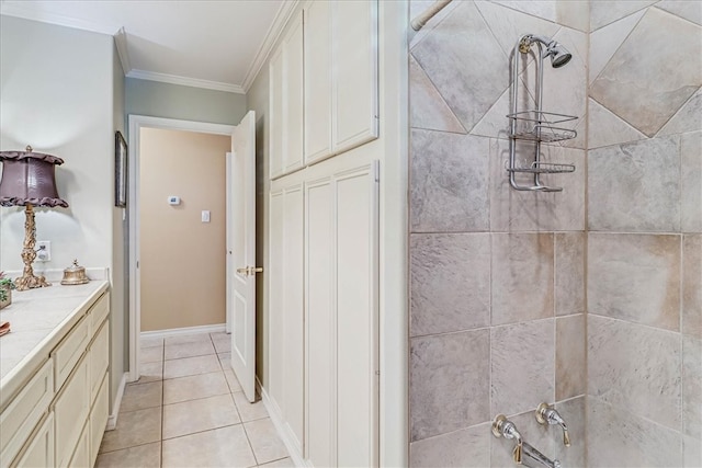 bathroom with vanity, tile patterned flooring, tiled shower / bath combo, and ornamental molding