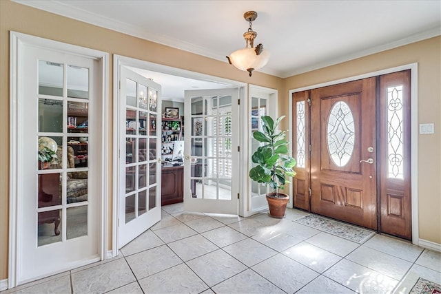 tiled entryway with ornamental molding