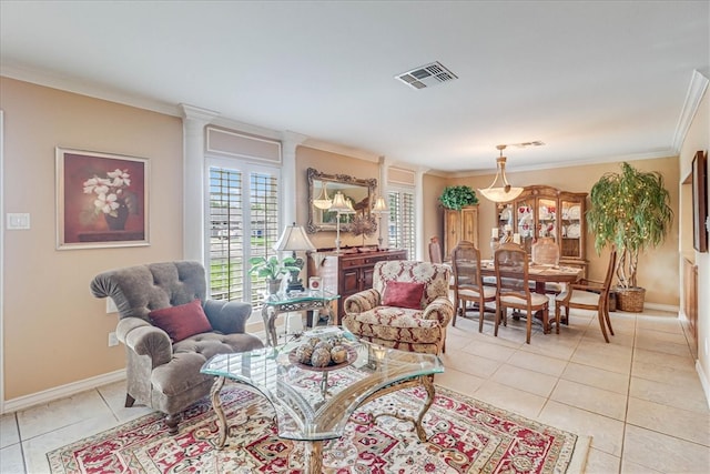 living room with light tile patterned floors and ornamental molding