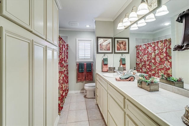 bathroom with ornamental molding, tile patterned flooring, vanity, and toilet