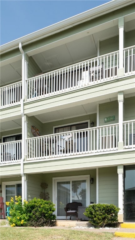 view of home's exterior featuring a balcony