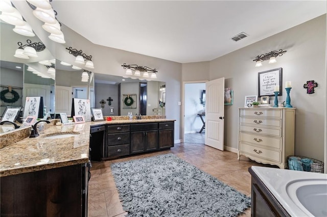 bathroom featuring vanity and tile patterned floors