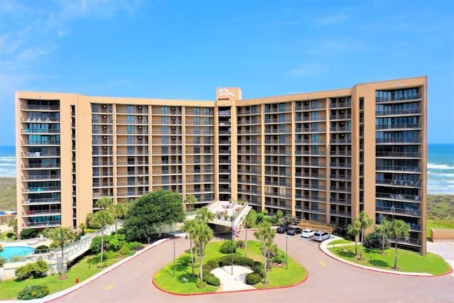 view of building exterior featuring a water view