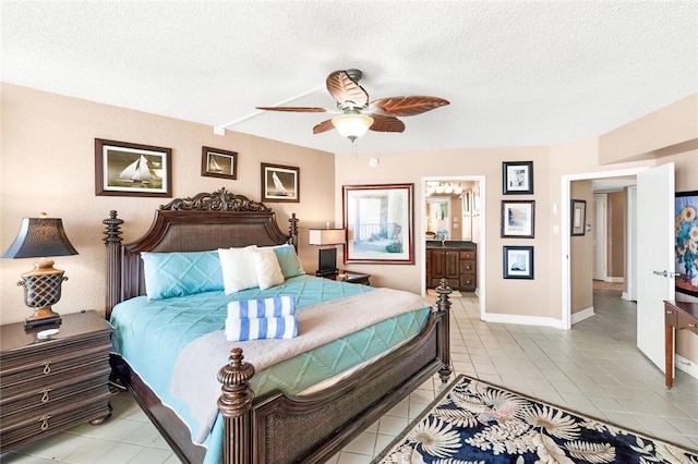 bedroom with light tile patterned floors, baseboards, and a textured ceiling