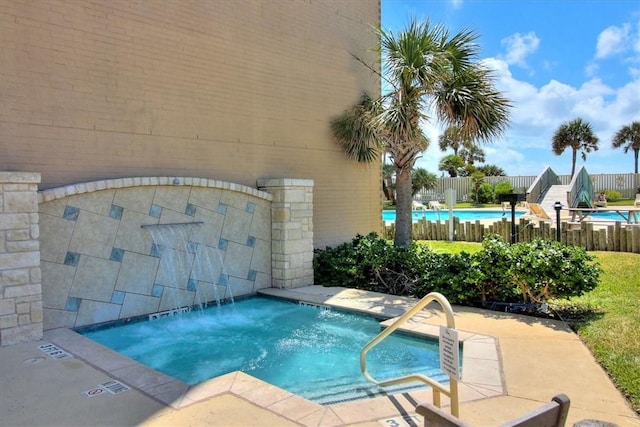 community pool with fence