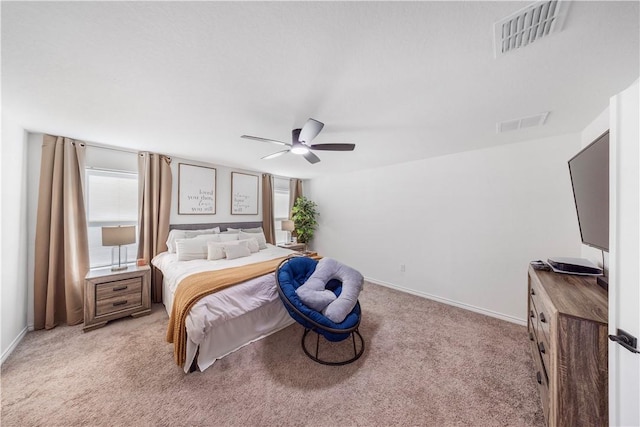 13246 Lorena Ochoa, San Antonio, TX 78221 - bedroom featuring light carpet, baseboards, and a ceiling fan