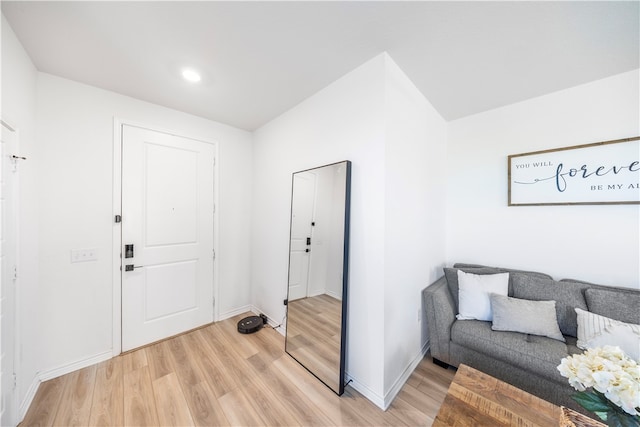 foyer with light hardwood / wood-style floors