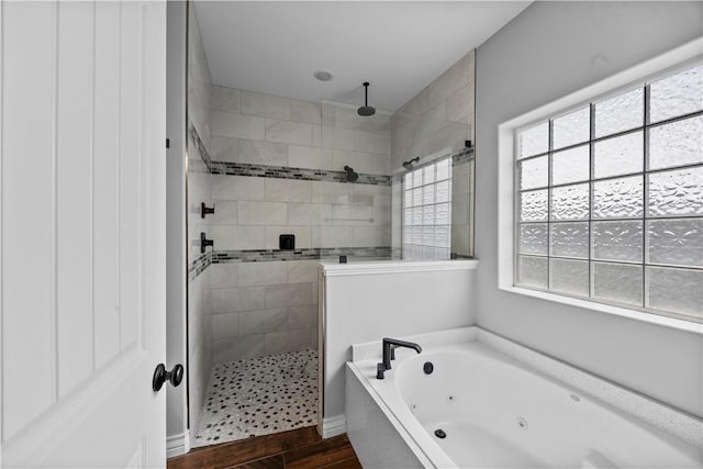 7746 Krypton Dr, Corpus Christi, TX 78414 - full bathroom with tiled shower, a whirlpool tub, and wood finished floors