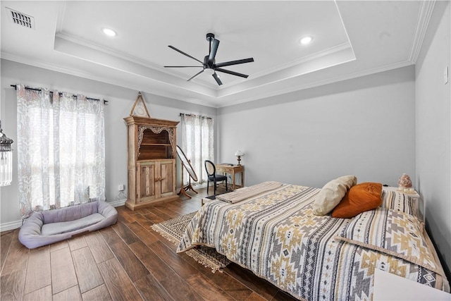 7746 Krypton Dr, Corpus Christi, TX 78414 - bedroom featuring a raised ceiling, wood finished floors, baseboards, crown molding, and recessed lighting