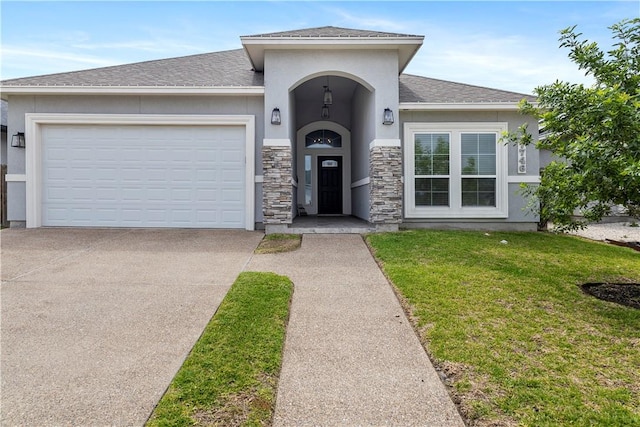 7746 Krypton Dr, Corpus Christi, TX 78414 - view of front of house with driveway, a garage, a front lawn, stucco siding, and a shingled roof