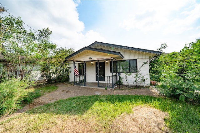 bungalow-style home featuring covered porch