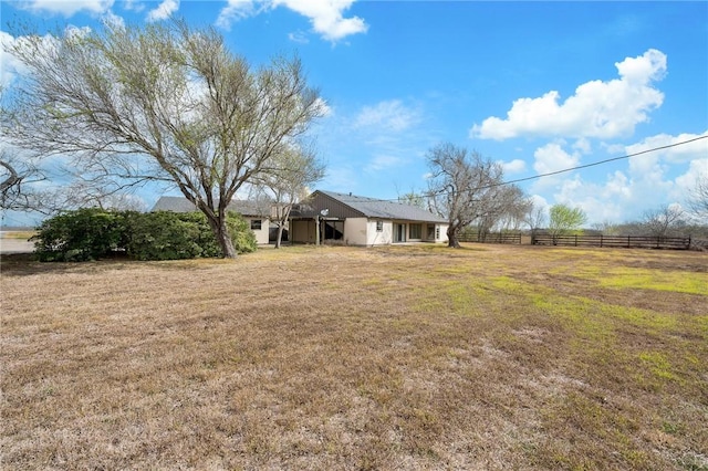 view of yard featuring fence