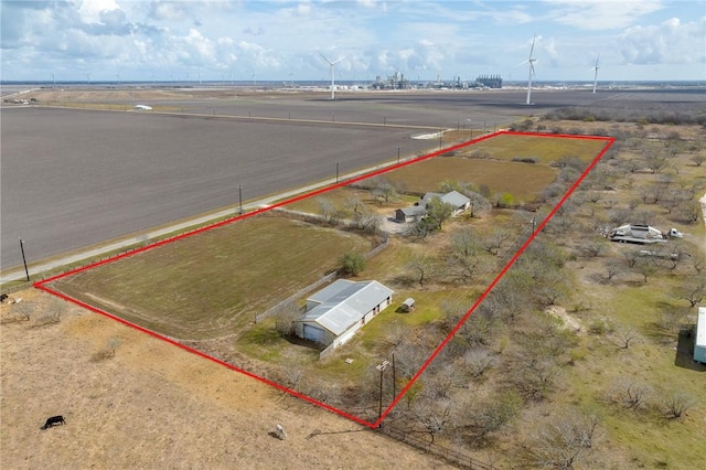 birds eye view of property with a rural view