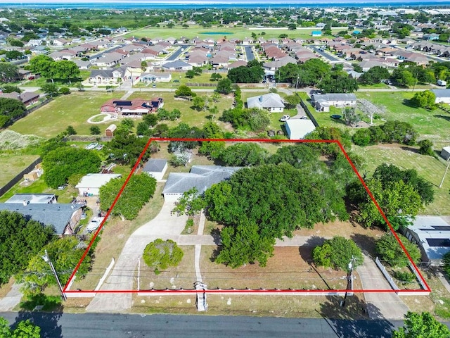 2201 Woodcrest Dr, Corpus Christi, TX 78418 - aerial view of residential area with property parcel outlined