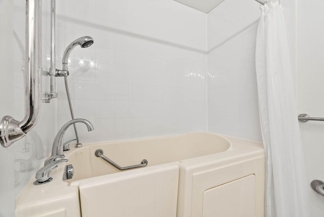 2201 Woodcrest Dr, Corpus Christi, TX 78418 - bathroom with shower / tub combo with curtain
