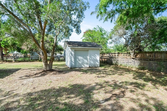 2201 Woodcrest Dr, Corpus Christi, TX 78418 - view of yard featuring an outdoor structure