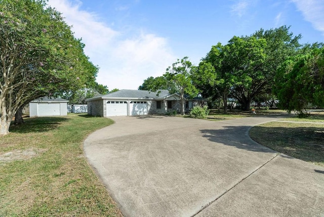 2201 Woodcrest Dr, Corpus Christi, TX 78418 - ranch-style house featuring a front yard and driveway