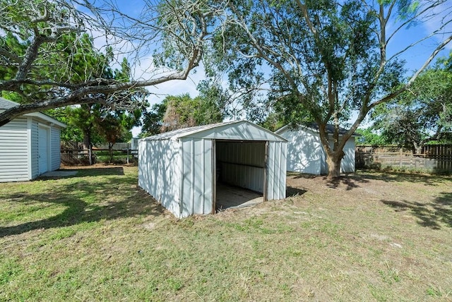 2201 Woodcrest Dr, Corpus Christi, TX 78418 - view of shed with a fenced backyard