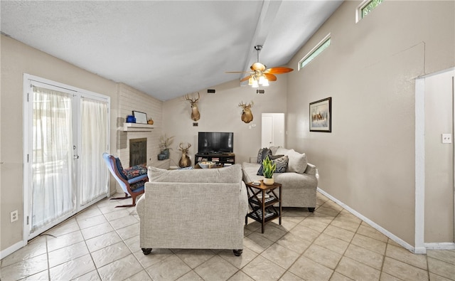 living room with ceiling fan, plenty of natural light, high vaulted ceiling, and a brick fireplace